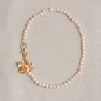 Collar con perlas naturales y orquidea phalaenopsis real
